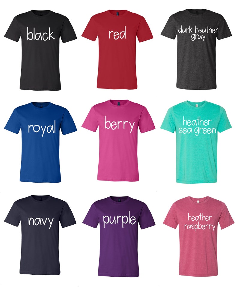 May include: Nine t-shirts in different colors, each with a different color name printed in white on the front. The colors are black, red, dark heather gray, royal blue, berry, heather sea green, navy, purple, and heather raspberry.