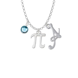 May include: Silver necklace with a blue crystal charm, a charm with the Greek letter pi, and a charm with the letter A.