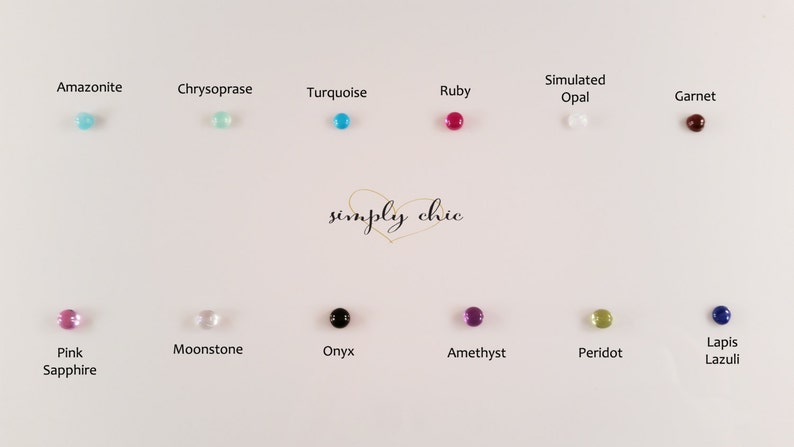 May include: A collection of small, round gemstones in various colors, including turquoise, ruby, and amethyst, are displayed on a white surface. The gemstones are labeled with their names, such as "Amazonite" and "Lapis Lazuli." The words "simply chic" are written in cursive.