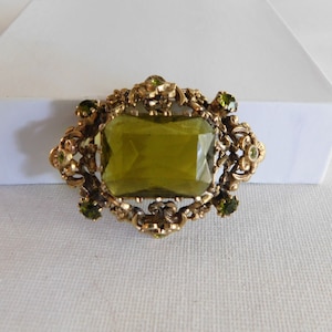 Gold Open Work Filigree Green Rhinestone Brooch Made In Austria