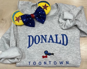 Donald Duck Embroidered Sweatshirt. Soft and Cozy stitched with vibrant colors. Famous Duck.
