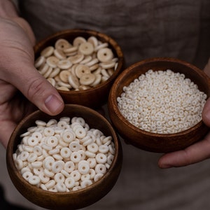 Replika koralika w kształcie kości dysku