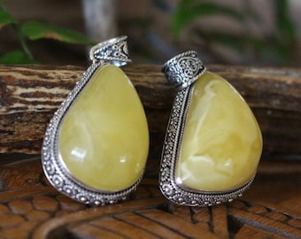 Yolk Amber and Silver Viking Inspired pendant