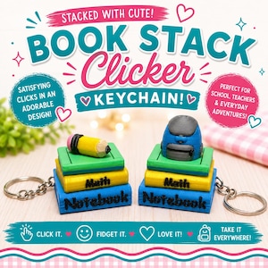 May include: Two book stack clicker keychains featuring a green, yellow, and blue book base with the text Math and Notebook printed on the sides. One keychain has a yellow pencil on top, and the other has a small blue and gray backpack on top.