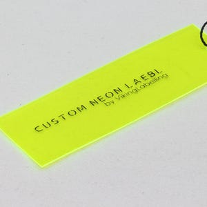 Zacht pvc-schommellabel, plastic hanglabel, aangepaste doorzichtige label, neon hanglabel, plastic hanglabel, plastic label voor kleding, gratis verzending.