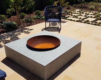 Large square concrete fire pit, square custom handmade real charcoal concrete fire pit with black metal bowl.