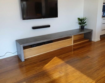 3m modern hardwood and concrete TV unit, bespoke handcrafted entertainment stand with Vic Ash timber cabinetry.