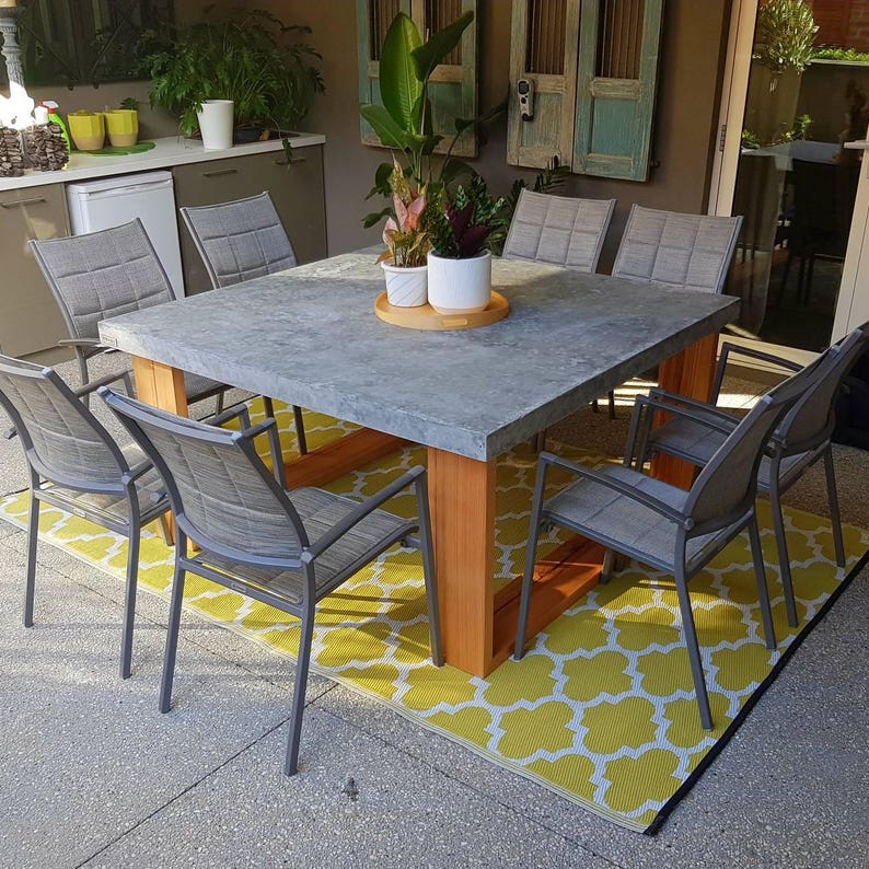 Rectangular Polished Concrete Dining Table With Loop End Timber Base