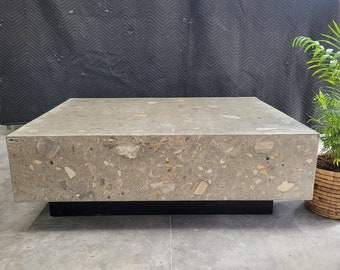 Large concrete coffee table exposed Tuscan stones grey cement. Handmade coffee table with black timber base custom coffee table unique table