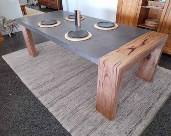 Concrete dining table 4 post base hardwood loop feature inlay 8 to 10 seater 2.4m polished concrete dining or patio furniture.