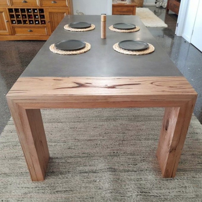 Concrete dining table 4 post base hardwood loop feature inlay 8 to 10 seater 2.4m polished concrete dining or patio furniture. Etsy