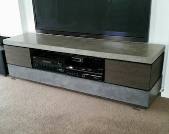 Polished concrete tv unit, entertainment unit, tv stand. Tasmanian Oak drawers with charcoal and natural concrete finish.