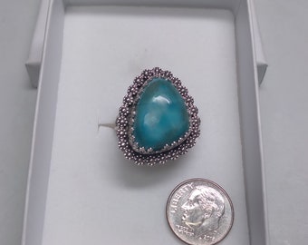 ladies ring 15 x 20 mm Larimar size 8 3/4 .  AWESOME STONE  it has a new style band.