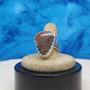 Yowie Boulder Opal sterling silver ring, size 9 3/4  is set in a scalloped bezel and with a blossom band.