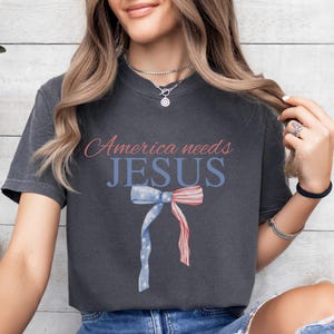Faith Apparel Unisex T-shirt, America Needs Jesus, Patriotic Christian Gift, American Flag Bow Tee, Religious Shirt