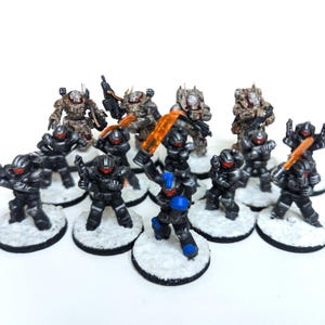 SciFi Soldier And Terminator Painted Miniatures On Snow Bases