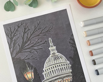 May include: An illustration of the U.S. Capitol Building at night, with a dark gray sky and a silhouetted tree. A vintage-style street lamp is lit, and the building's dome is illuminated. The artwork is on white paper.