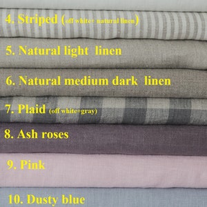May include: A stack of 13 fabric swatches in various colors, including burnt orange, white, off-white, striped, natural linen, plaid, ash rose, pink, dusty blue, royal blue, charcoal gray, and black.