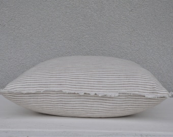 Natural linen striped throw pillowcase with zipper. Bed linen pillow cover with fringes.