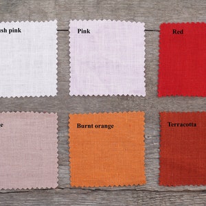 May include: Six fabric swatches in different colors: blush pink, pink, red, beige, burnt orange, and terracotta.