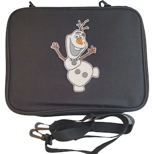 May include: Black rectangular carrying case with a zipper closure and a detachable shoulder strap. The case features an embroidered image of Olaf, the snowman character from the movie Frozen. The image is in white, orange, and brown.
