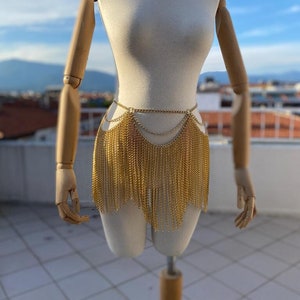 Gold body jewellery skirt top