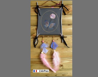 Decorative embroidered butterfly frame with feathers and beads