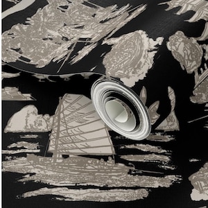 May include: A roll of wallpaper featuring a black and beige nautical design. The pattern includes stylized sailboats, clouds, and abstract shapes. The paper is rolled up, revealing the white backing.