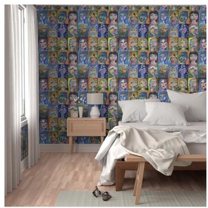 May include: A bedroom with a bed, nightstand, and a lamp. The wall is covered in wallpaper with a pattern of colorful faces.