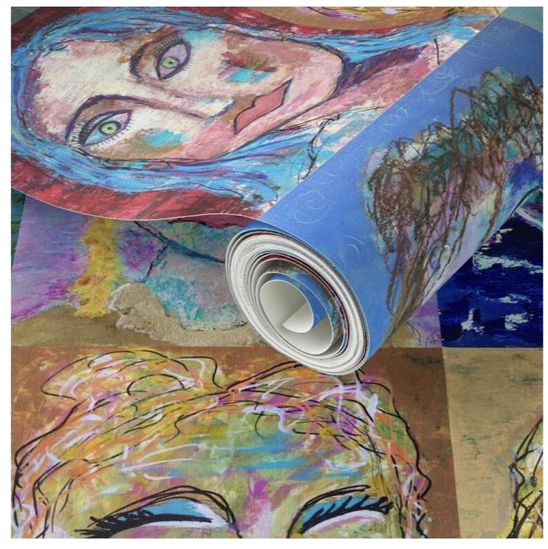 May include: A roll of colorful wallpaper with a repeating pattern of abstract faces. The wallpaper is blue, pink, yellow, green, and brown. The faces are drawn in a loose, expressive style.