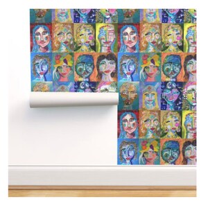 May include: A colorful wallpaper design featuring a repeating pattern of abstract faces. The faces are painted in a variety of colors, including blue, green, yellow, orange, and red. The wallpaper is perfect for adding a touch of whimsy and personality to any room.