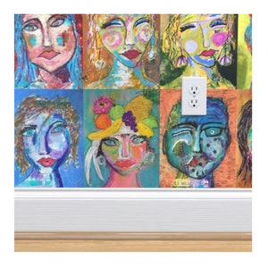 May include: A colorful collage of nine abstract faces painted in a variety of styles. The faces are all different shapes and sizes, and they are painted in bright, bold colors. The collage is framed by a white border.
