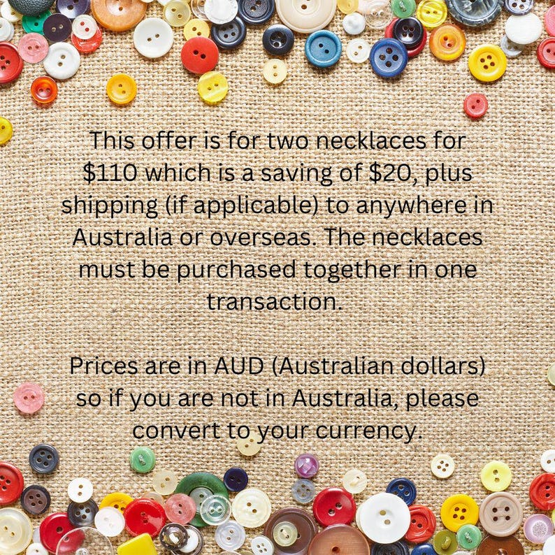 May include: A variety of colourful buttons in different sizes and shades, such as red, yellow, blue, and white, are scattered on a textured, tan background. The image contains text about a necklace offer.