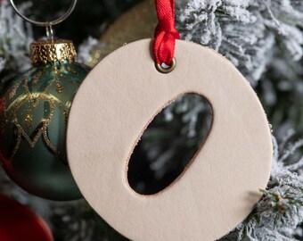 O | Leather Ornament