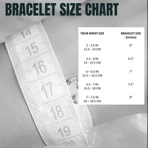 May include: A white measuring tape with black markings shows inches and centimetres. The chart shows bracelet sizes in inches based on wrist size in inches and centimetres.