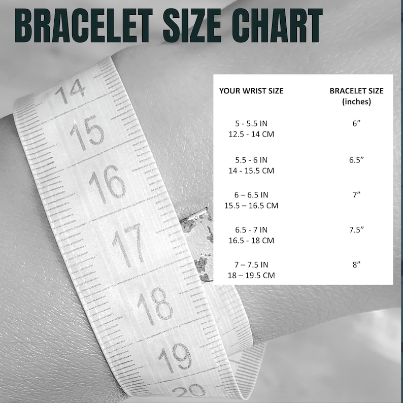 K&ouml;nnte beinhalten: Ein wei&szlig;es Ma&szlig;band mit schwarzen Markierungen zeigt Zoll und Zentimeter. Die Tabelle zeigt Armbandgr&ouml;&szlig;en in Zoll basierend auf der Handgelenksgr&ouml;&szlig;e in Zoll und Zentimetern.