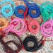 3 mm. African vulcanite tiny vinyl disc beads, strand 16/17", 15 colors