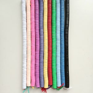 14 mm. African vulcanite vinyl heishi beads, strand 12 inches (30 cm.), 12 compact colors