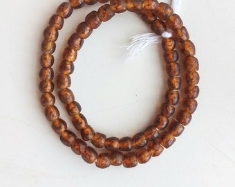 45-46 African recycled glass beads, (9 x 7-8 ), 14 inches strand, brown with black inclusions in their own depth