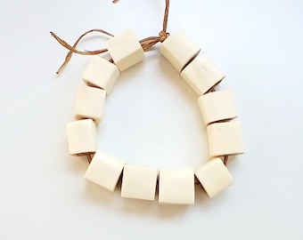 12 cubic cow bone beads from Kenya, 21-23 x 20-23 mm., shipped from Spain