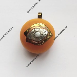 1 African amber pendant, 38 x 32 mm., Mali pendant, synthetic resin pendant,African trade