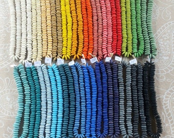 8 inches string, 35-40 large saucer beads, 13-15 x 4-5 mm., 27 colors + rainbow