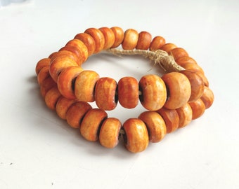 40 cow bone beads from Kenya, rondelle shaped with wood inlaid, shipped from Spain
