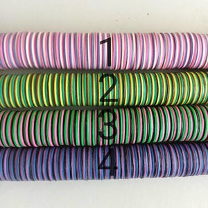 14 mm. African vulcanite vinyl heishi beads, strand 12 inches (30 cm.), mix of 3 colors