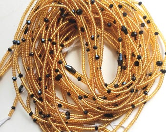 Gold with black crystal waist beads, tie on, strand 42-44 inches, 108-112 cm.