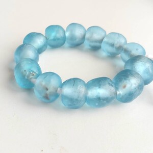 12 African recycled glass beads, (19-20 mm diam.), 8 inches short strand, aqua color