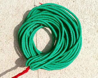 4 mm. green African vulcanite vinyl heishi beads, strand 84 cm. (33 inches) #12