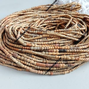 African clay beads, strand 30-32 inches of very tiny terracotta clay beads