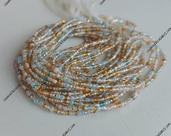 Gold, silver, pale pink and light blue African waist beads, tie on, strand 42-44 inches, 108-112 cm., mixed seed beads