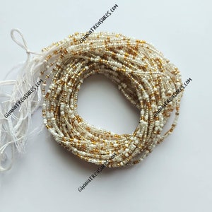 African waist beads, tie on, strand 42/44 inches, 108/112 cm., white and gold color seeds